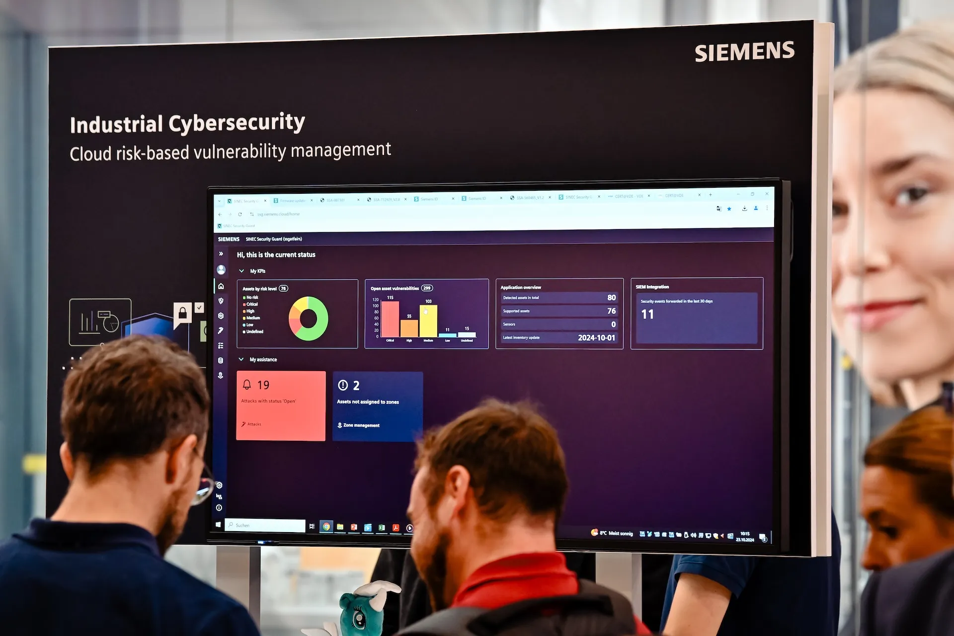 Siemens trade fair booth on cybersecurity, technical, clear, focused.