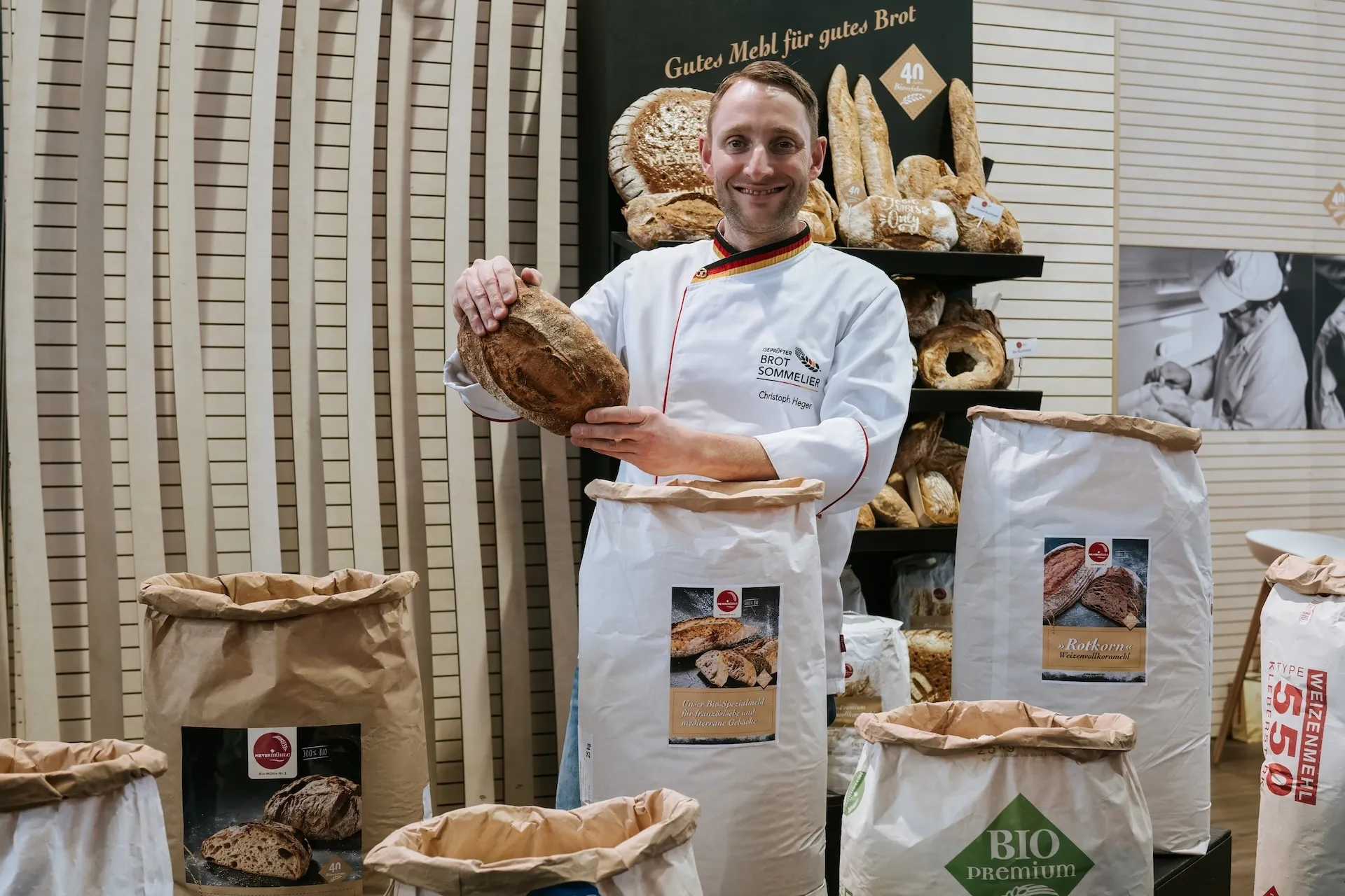 Bread sommelier presenting different types of flour at the Nuremberg trade fair