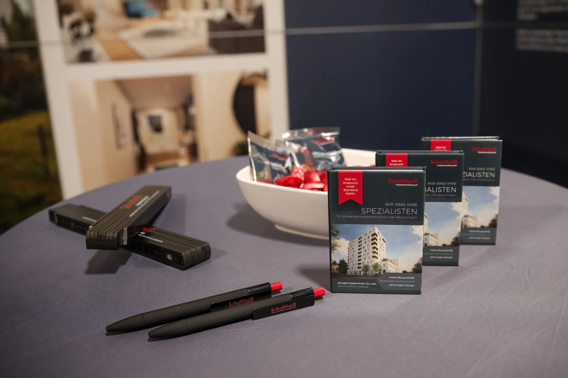 Advertising material at the booth, visually clear and well-structured photographed.