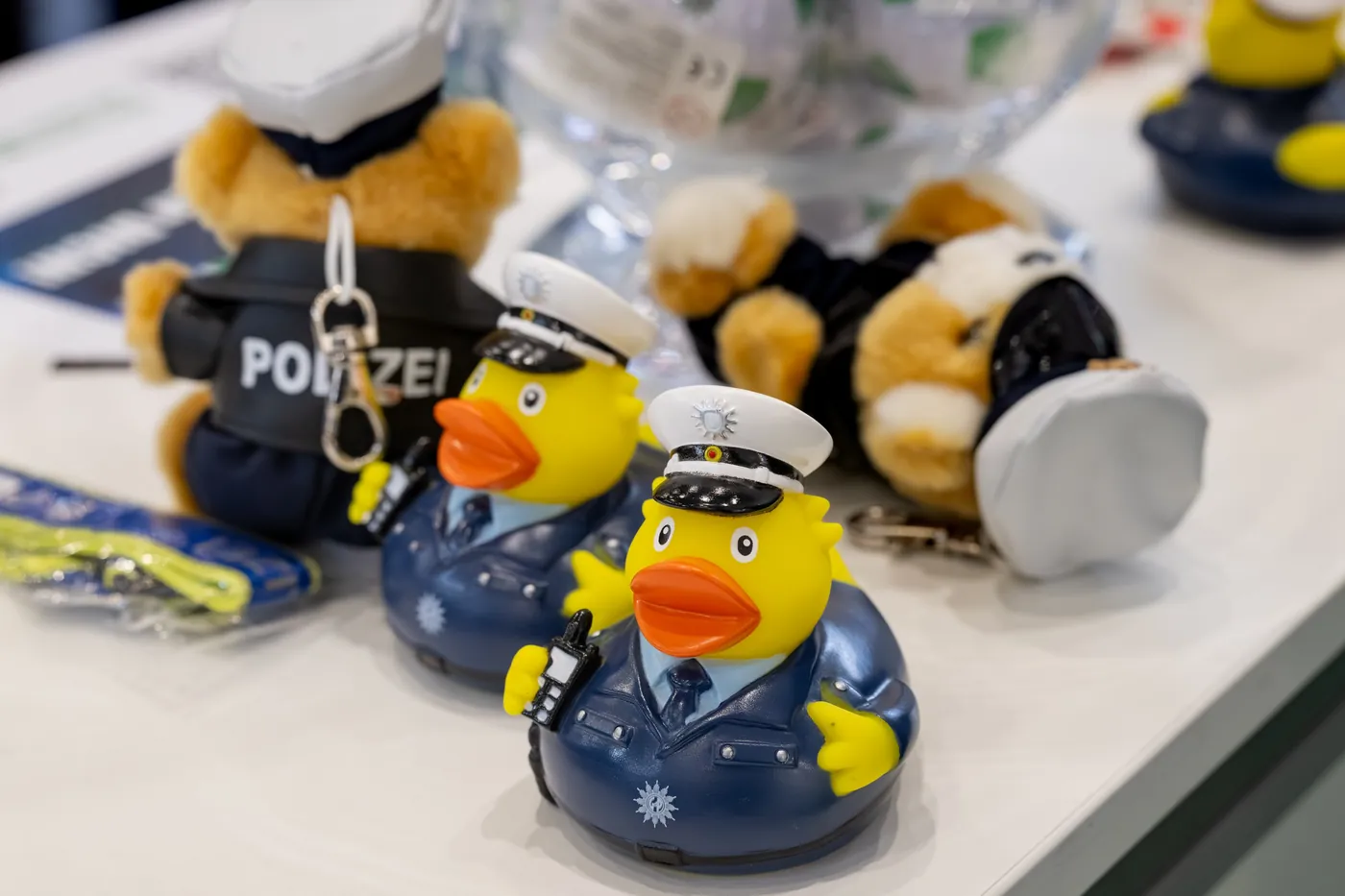 Police plush figures as promotional items at a booth at Enforce Tac in Nuremberg, detail shot