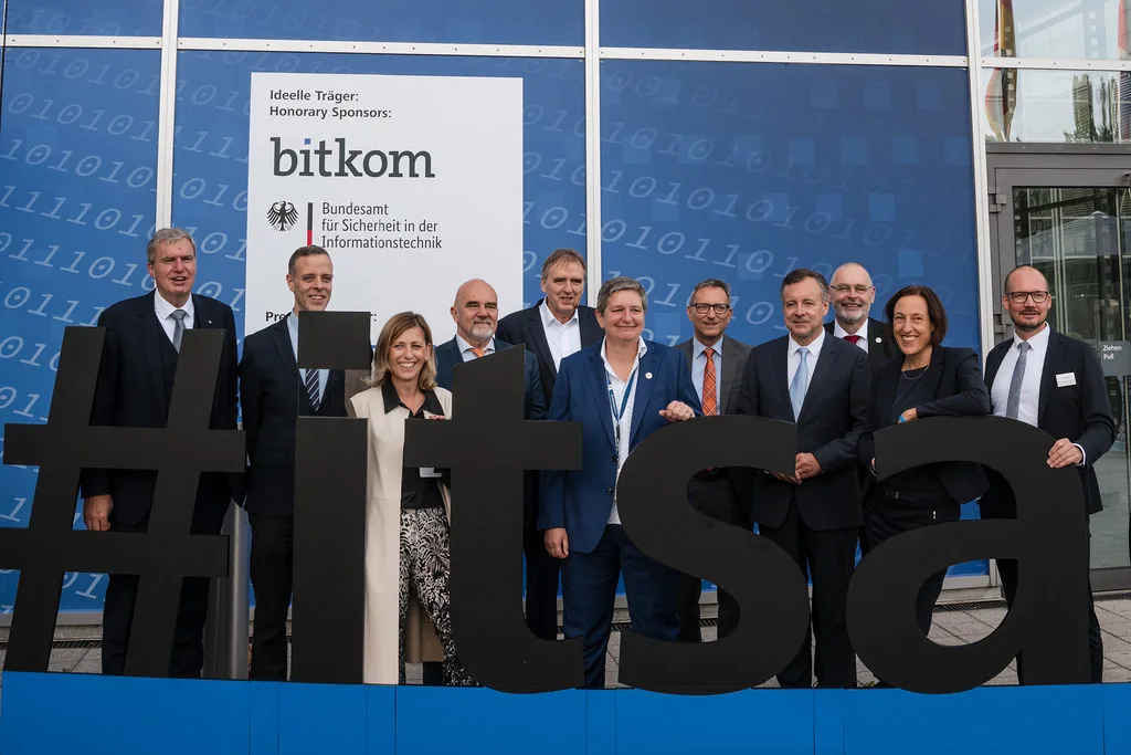Group behind the large #itsa letters at it-sa in Nuremberg