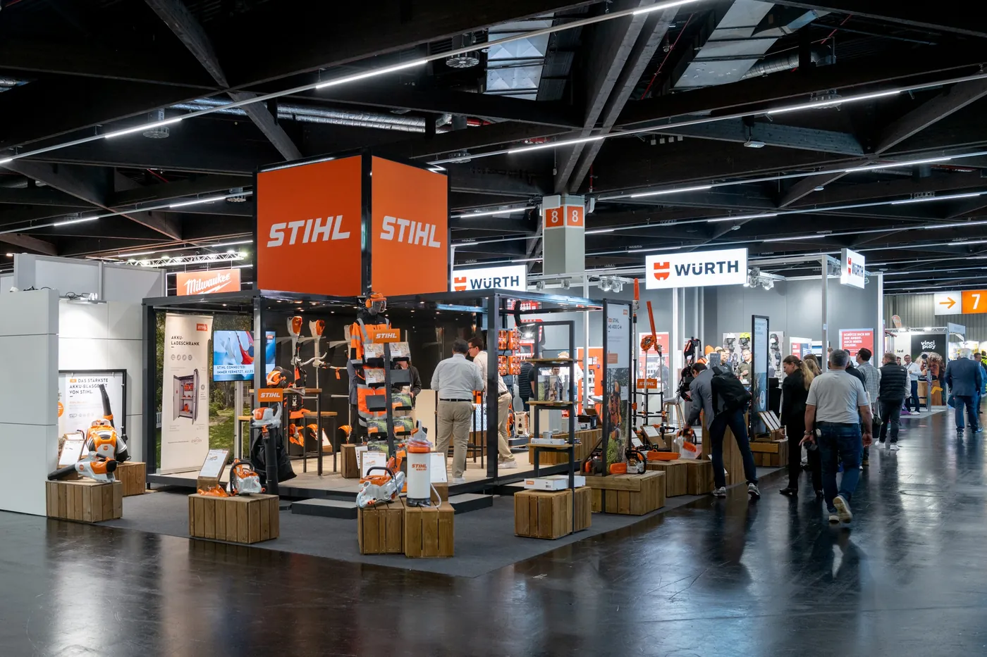 Booth with orange brand architecture and equipment at KOMMUNALE in Nuremberg