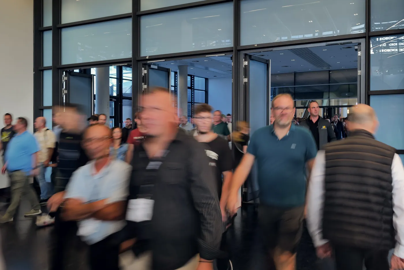 Visitors streaming into the exhibition hall in the morning