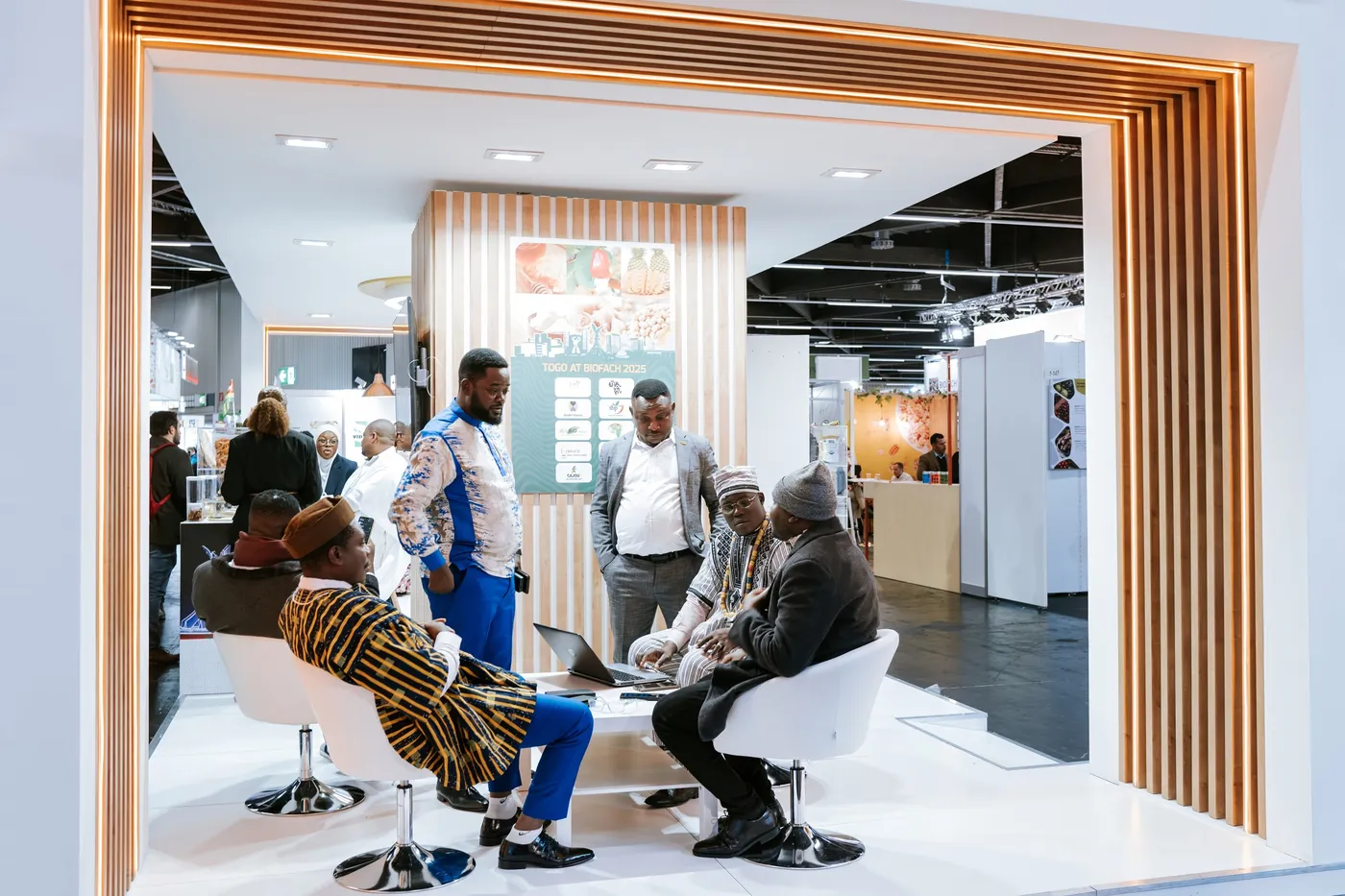 Bright wooden booth with seating and conversations