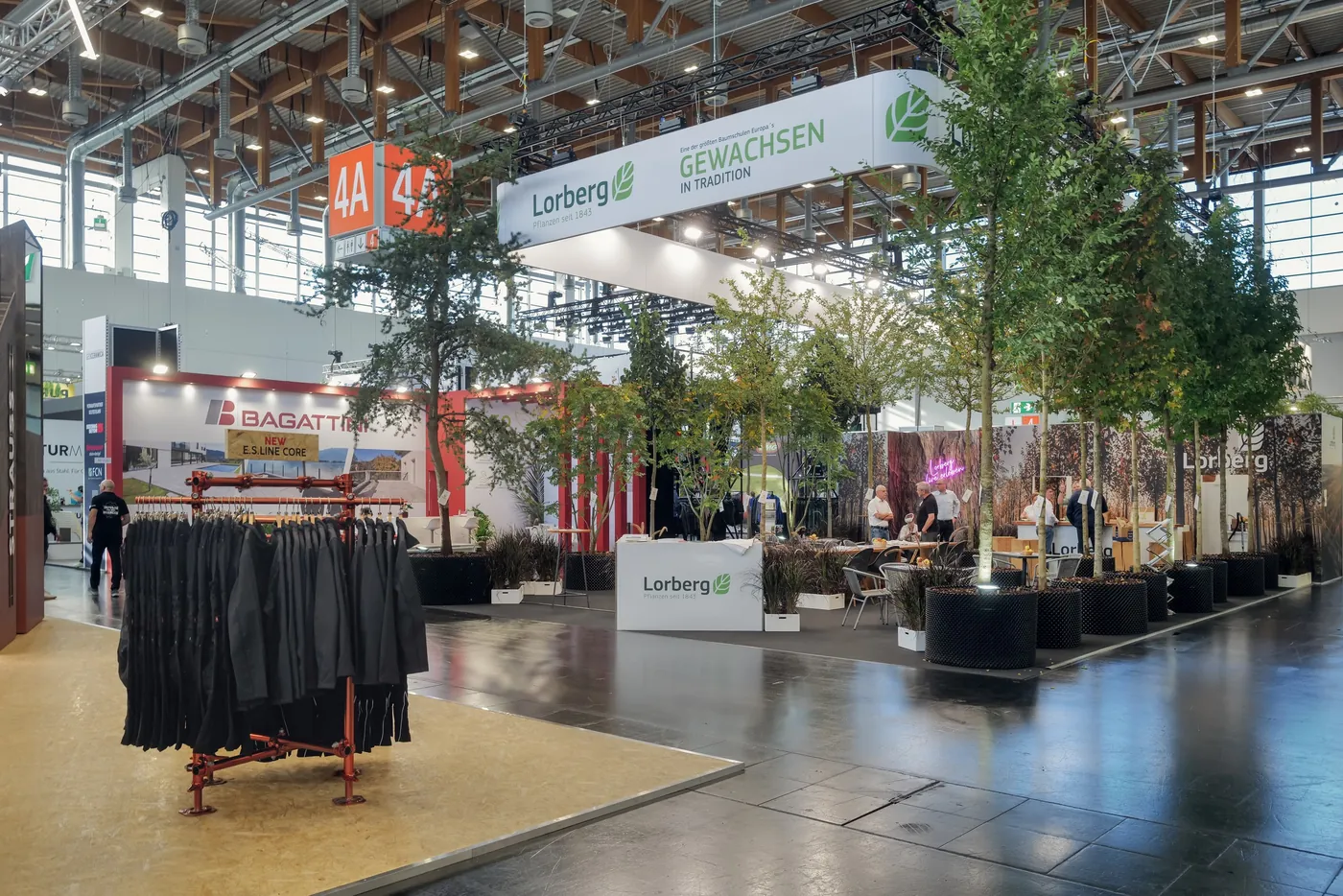 Trade fair booth with large trees